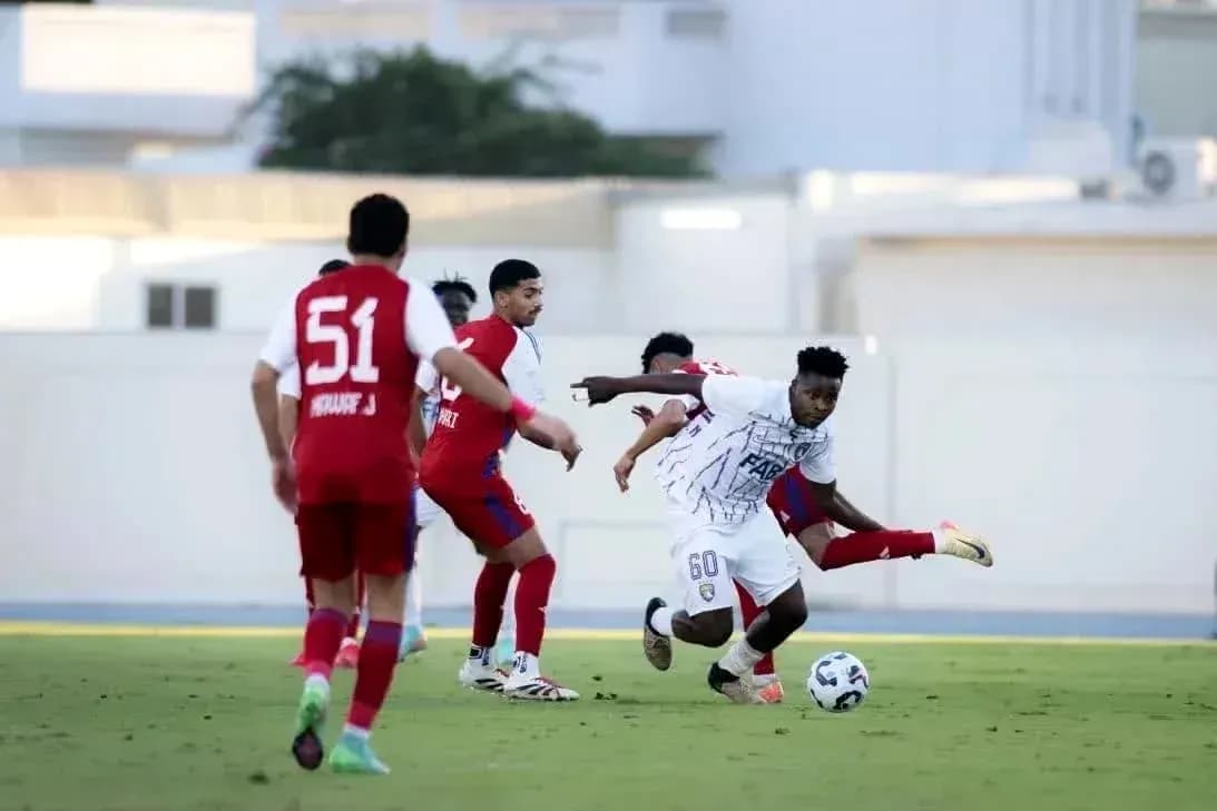 Player dribbling the ball during U23 match