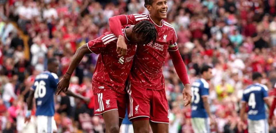 Liverpool players celebrating a goal during match