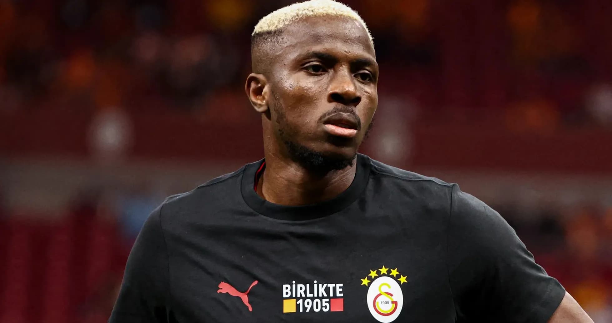 Player wearing Galatasaray training kit on pitch