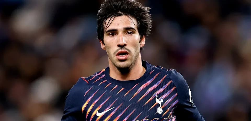 Player in Tottenham jersey during match action