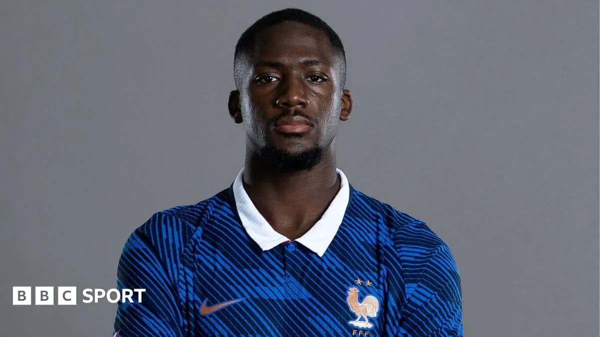 Player posing in France national team jersey