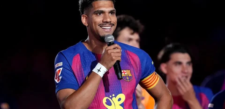 Player speaking into a microphone at event