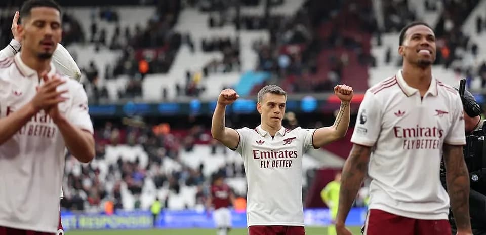 Arsenal players celebrating after match against West Ham