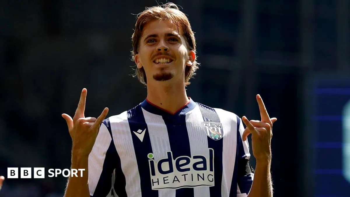Player celebrating a goal in West Bromwich Albion kit