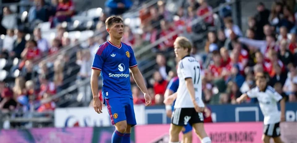 Manchester United player on field during match