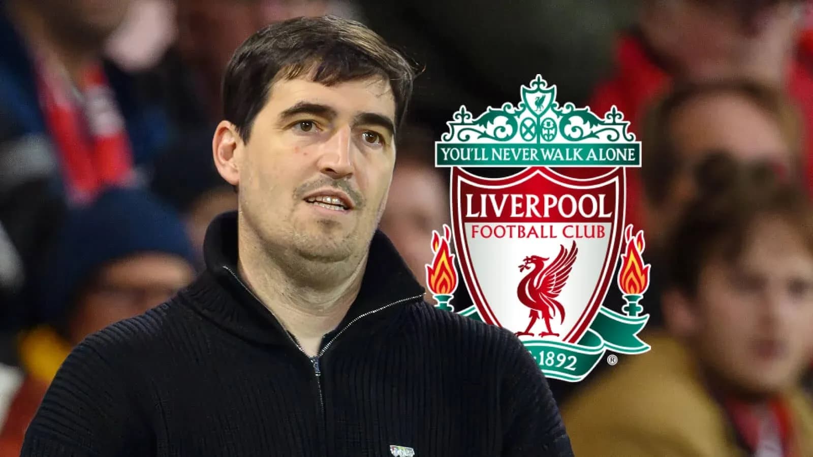 Man observing Liverpool FC logo in stadium