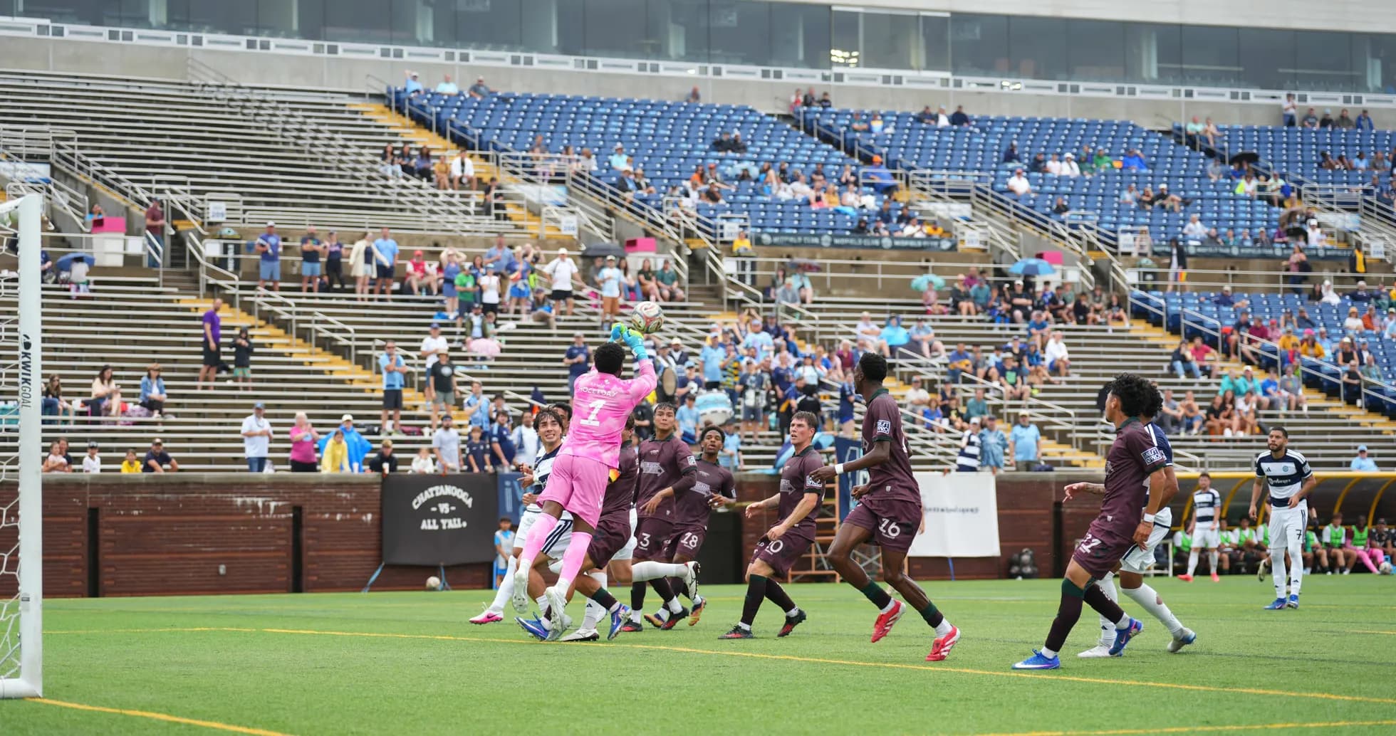 Goalkeeper making a save during MLS Next Pro match