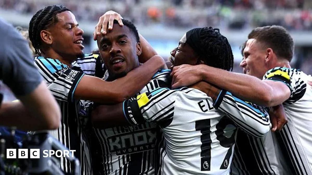 Players celebrating together after scoring a goal