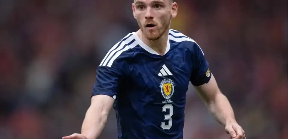 Player gesturing during match in Scotland jersey