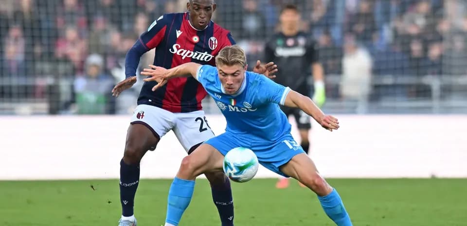 Players competing for the ball during Napoli match