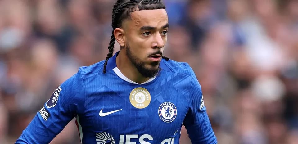 Chelsea player running with ball during match