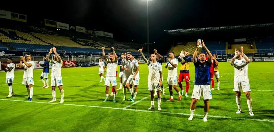 Players celebrating after UEFA Champions League match
