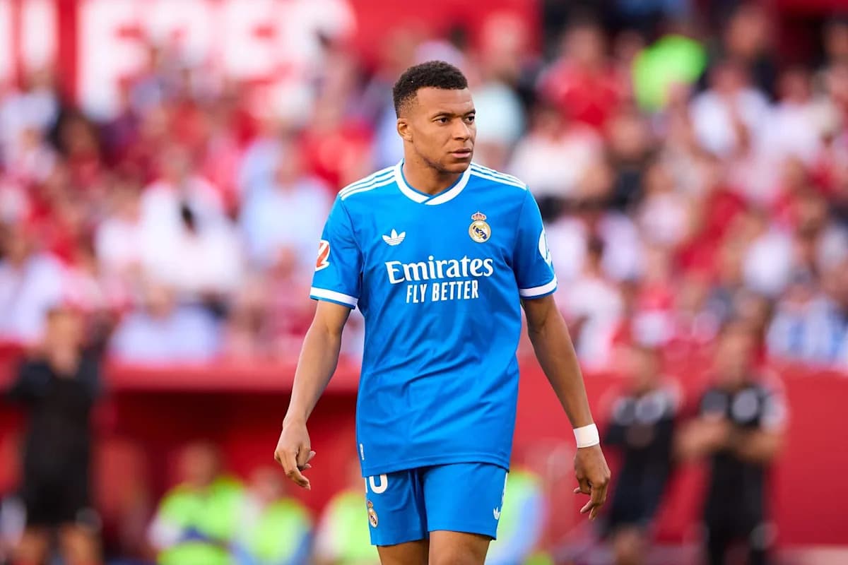 Player in blue Real Madrid kit on the field