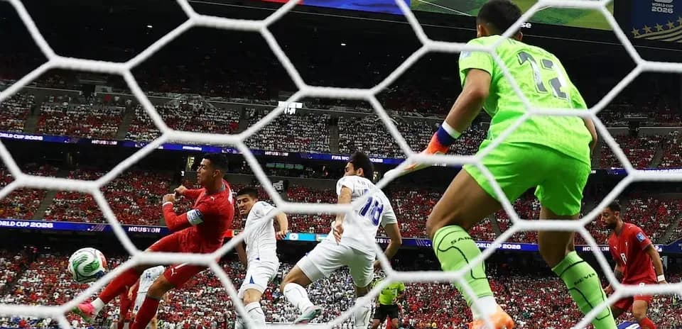 Goalkeeper preparing to save a shot on goal