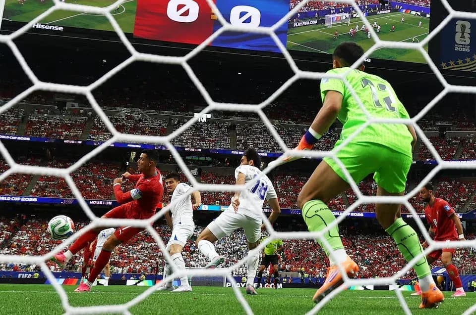 Goalkeeper preparing to save a shot on goal