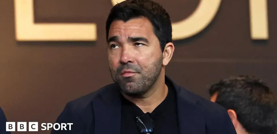 Person in a blazer at an event