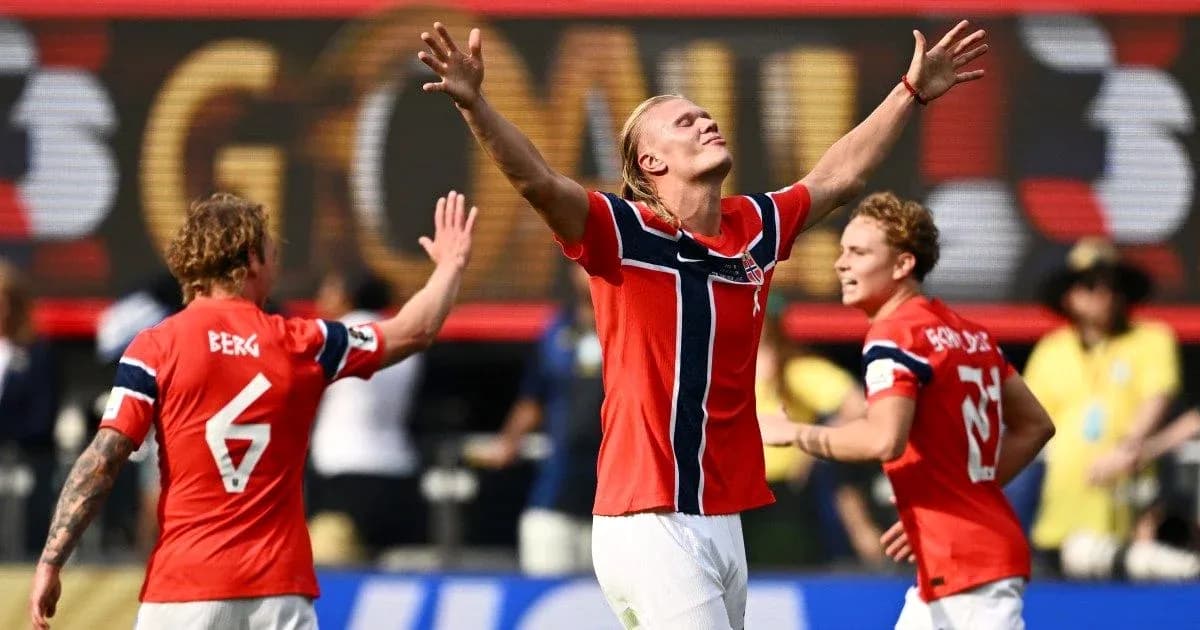 Norwegian players celebrating a goal on the field
