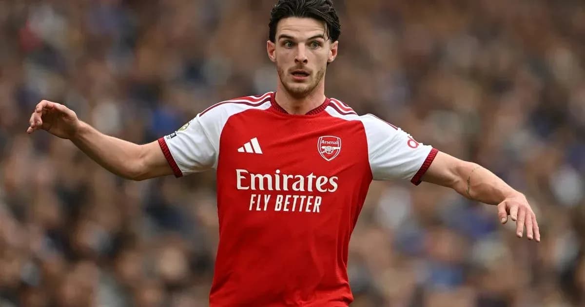 Player in Arsenal kit during match action