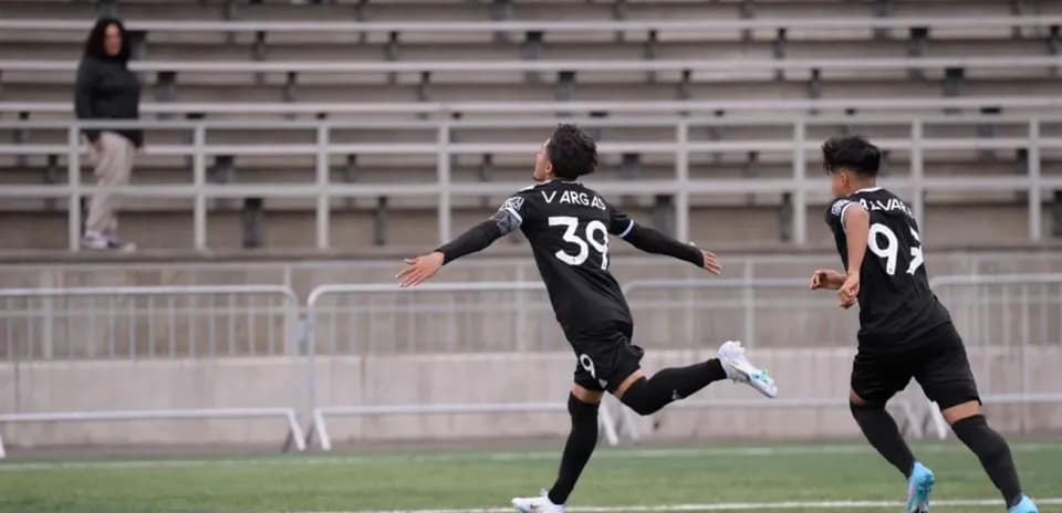 Player celebrating after scoring goal in match
