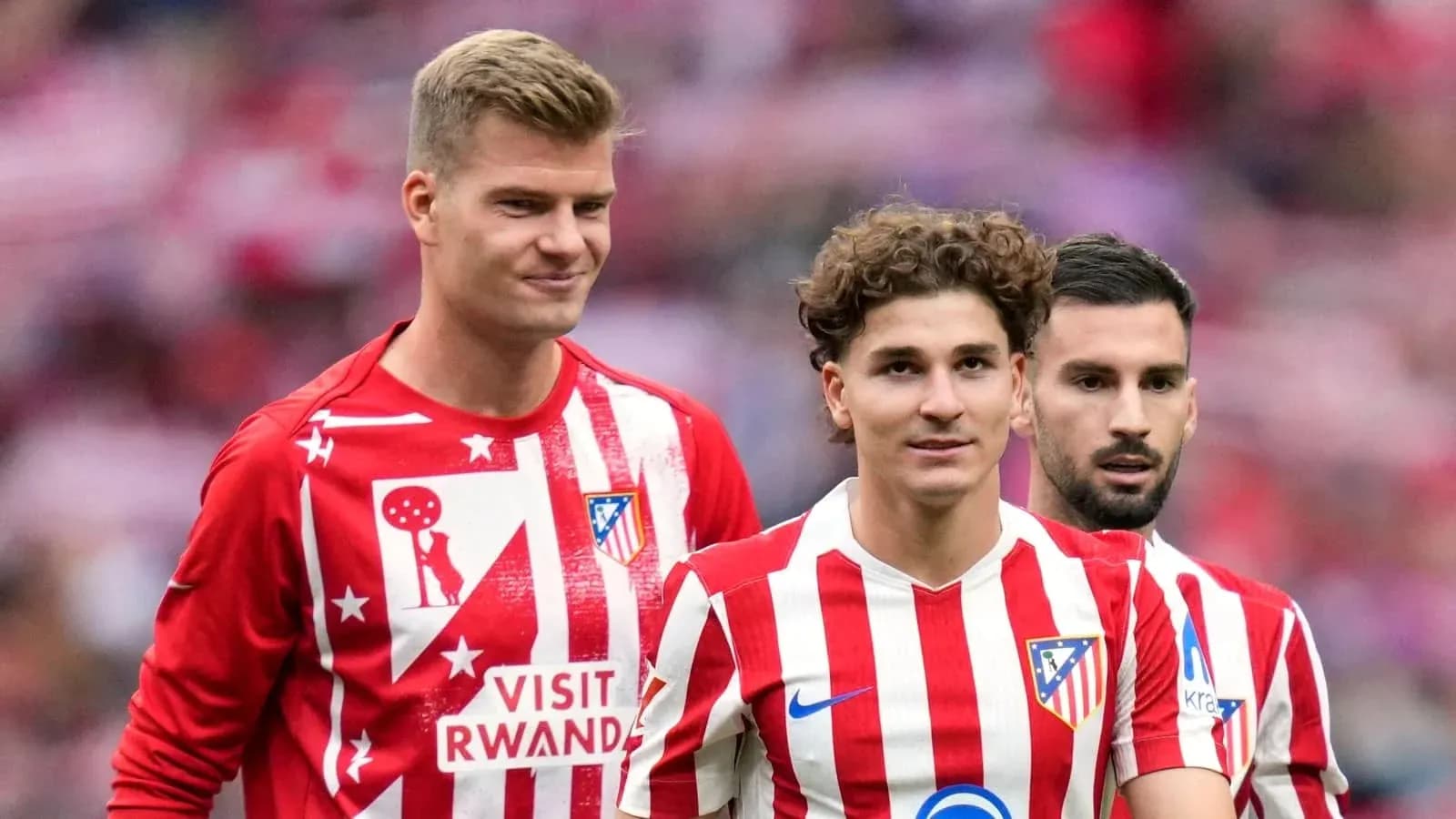 Atletico Madrid players in team jerseys before match