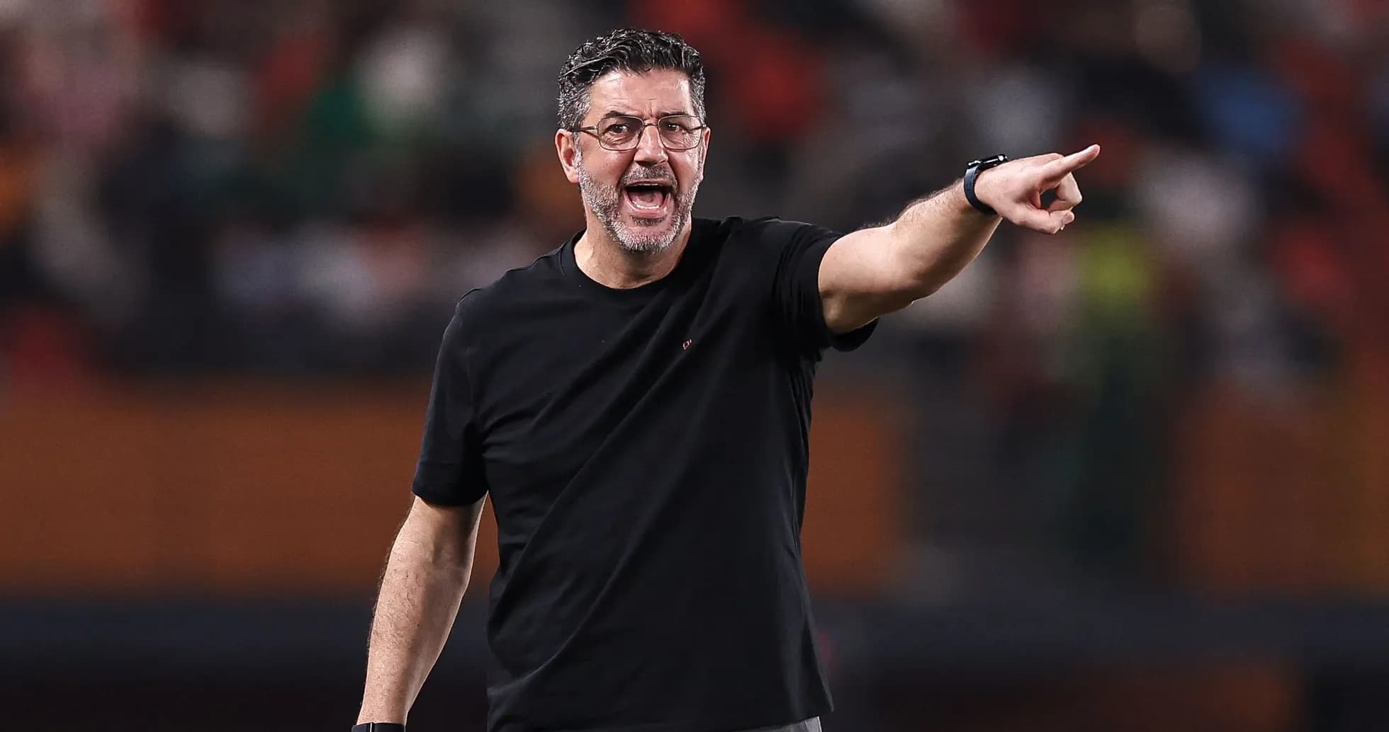 Coach giving instructions during a match