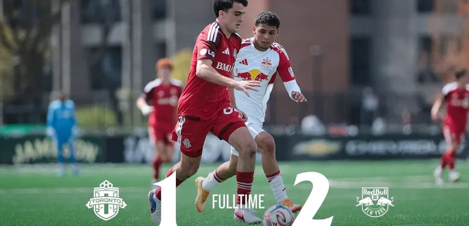 Toronto II player challenged by New York RB II player