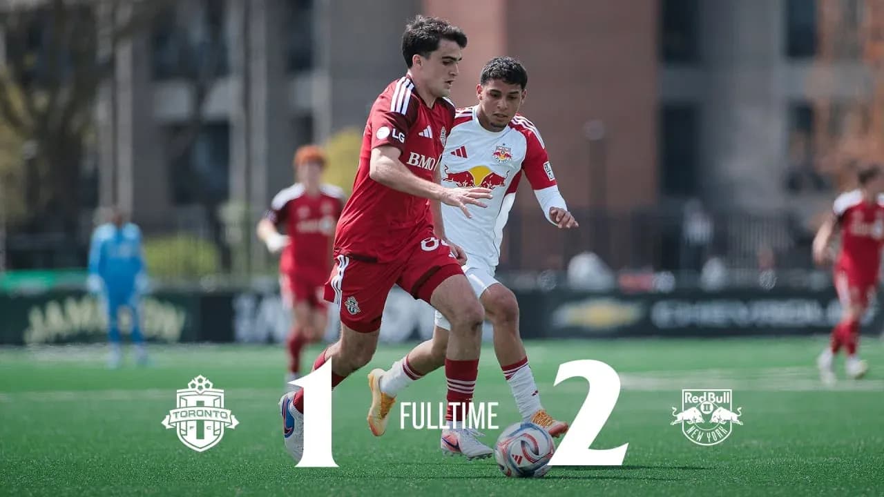 Toronto II player challenged by New York RB II player