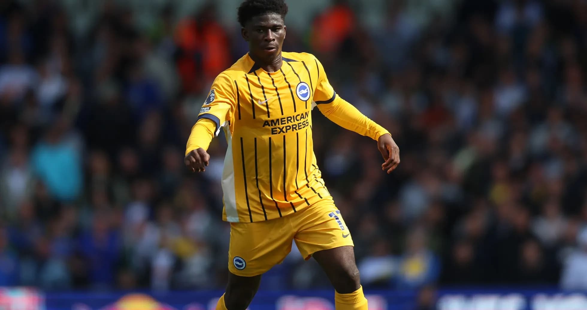 Player in yellow jersey during football match
