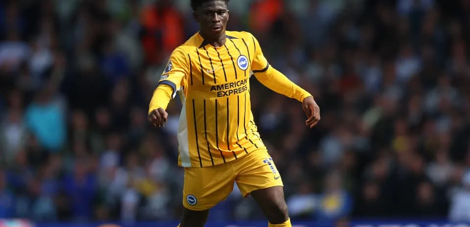 Player in yellow jersey during football match