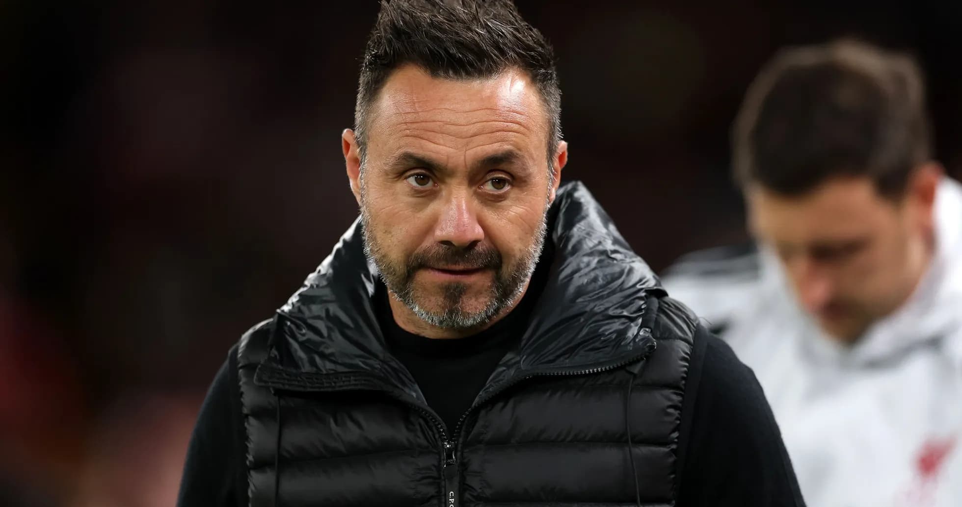 Manager on the sidelines during a match
