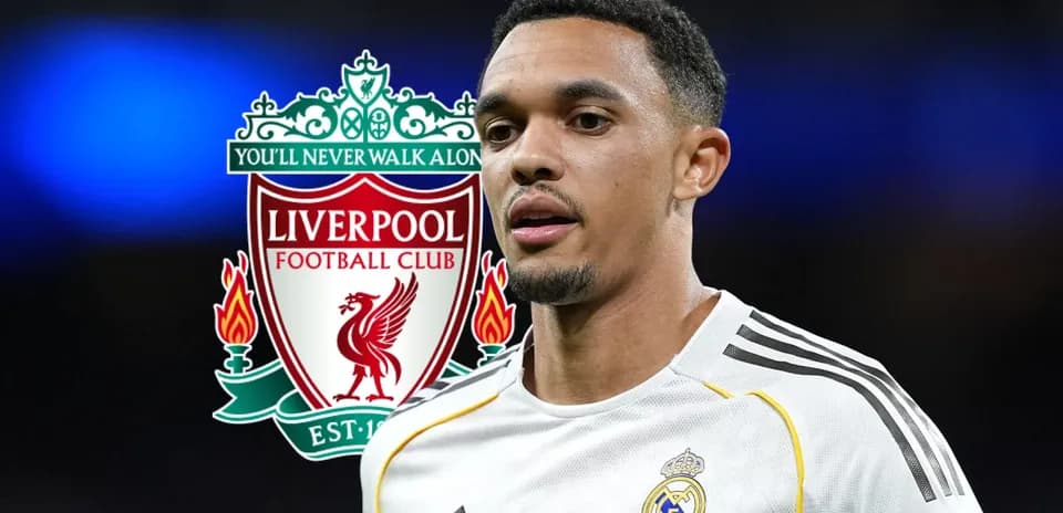 Player in white kit with Liverpool logo background