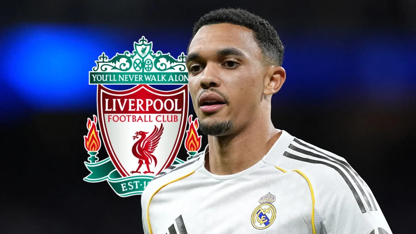 Player in white kit with Liverpool logo background