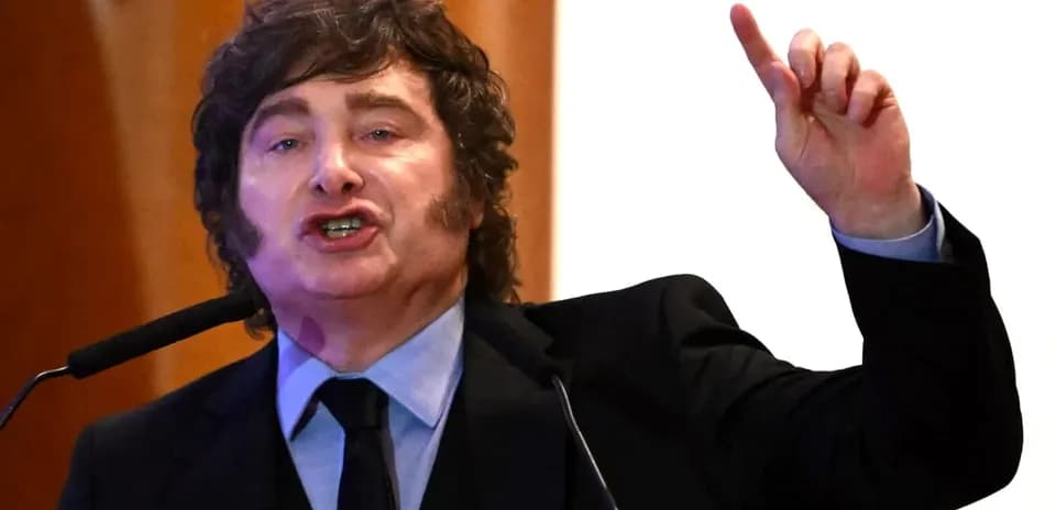 Man speaking passionately at a podium