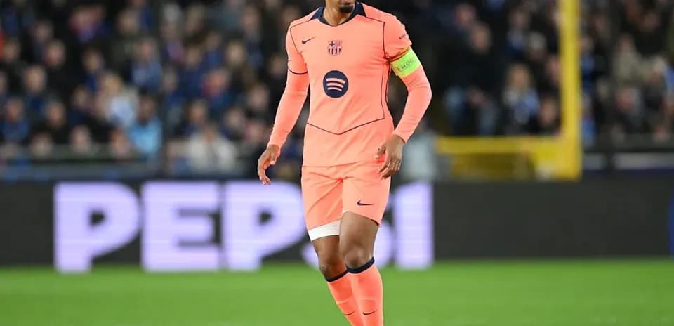 Player in pink uniform during football match