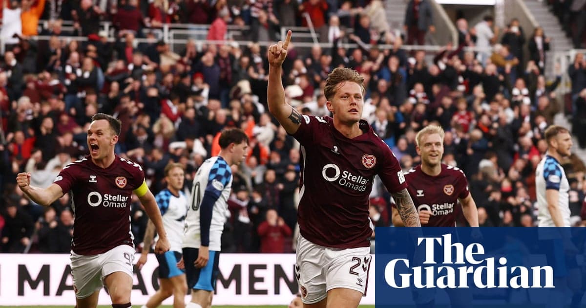 Hearts player celebrating a goal with teammates