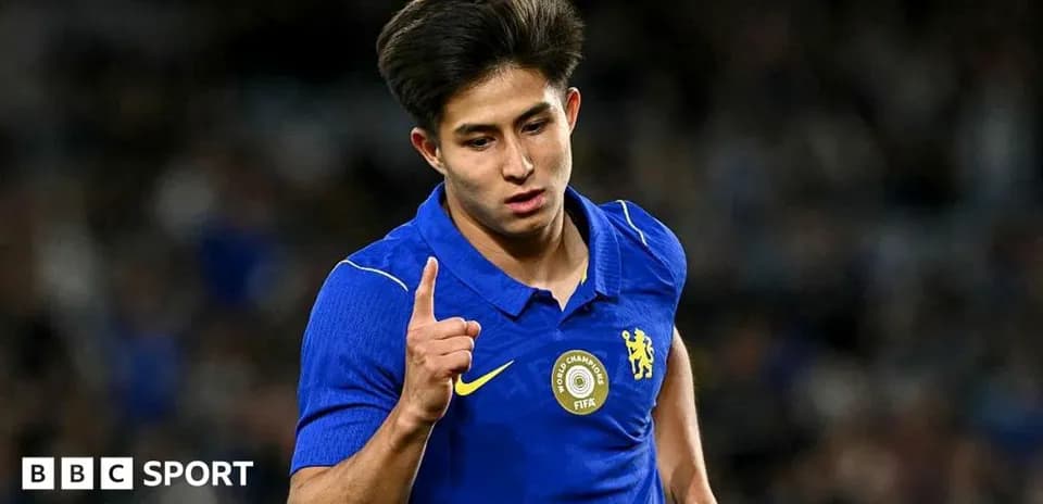Player celebrating a goal wearing blue jersey