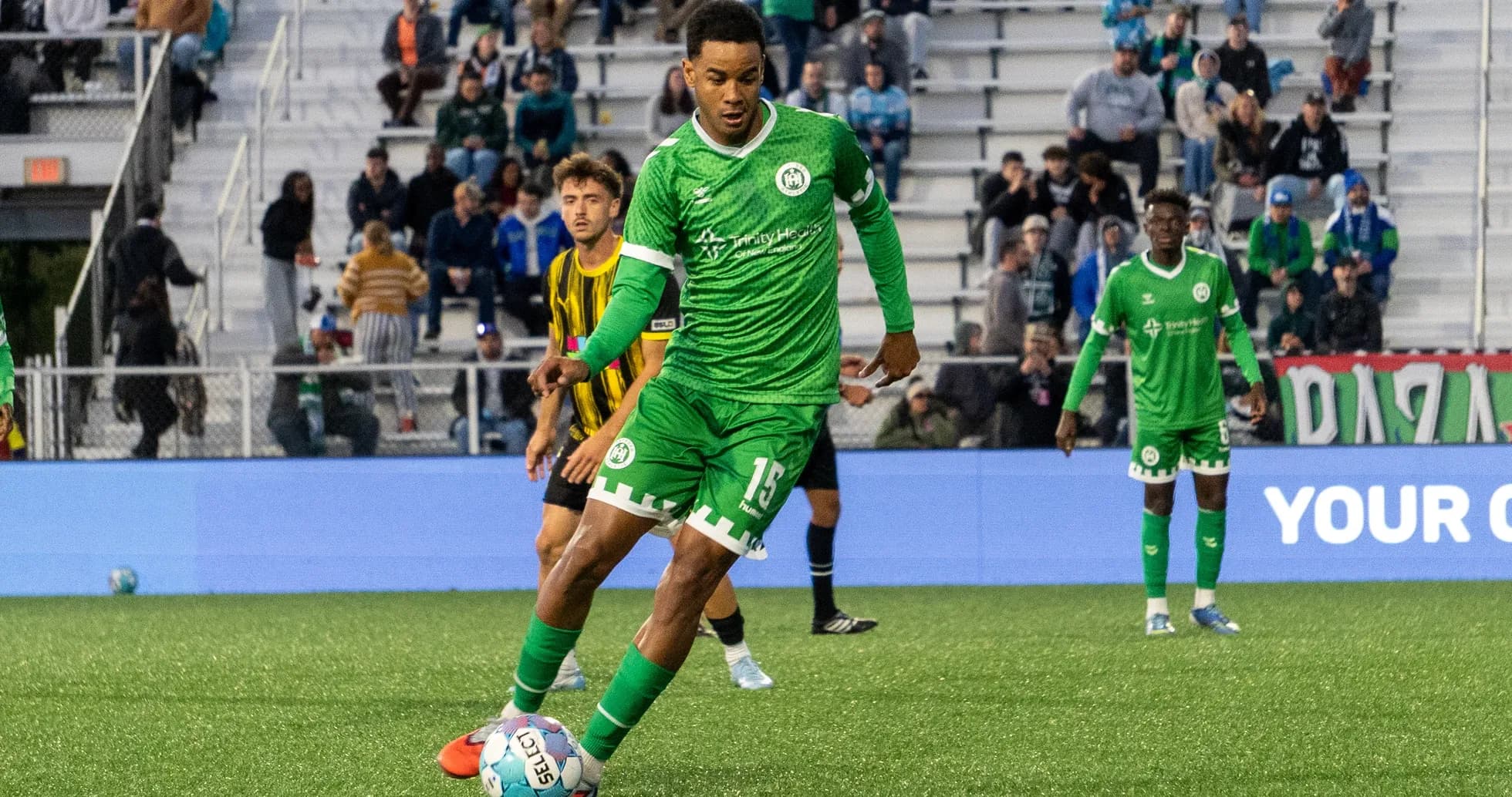 Hartford Athletic player preparing to kick the ball