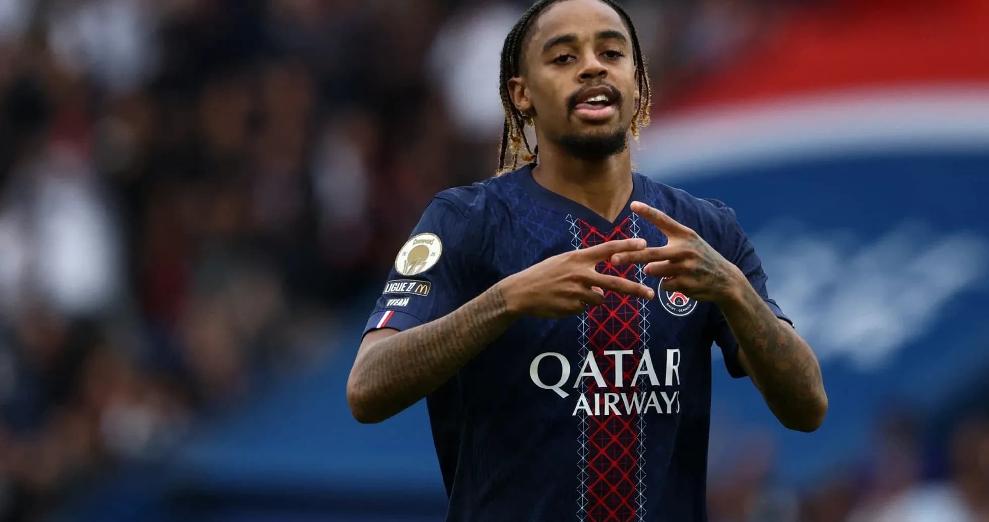 Player celebrating during a match for Paris Saint-Germain