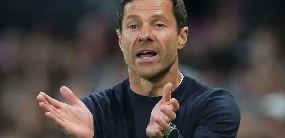 Coach gesturing during a football match
