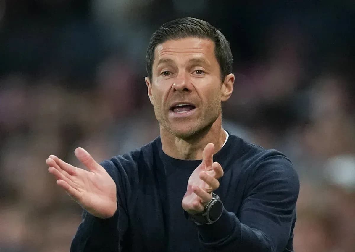 Coach gesturing during a football match