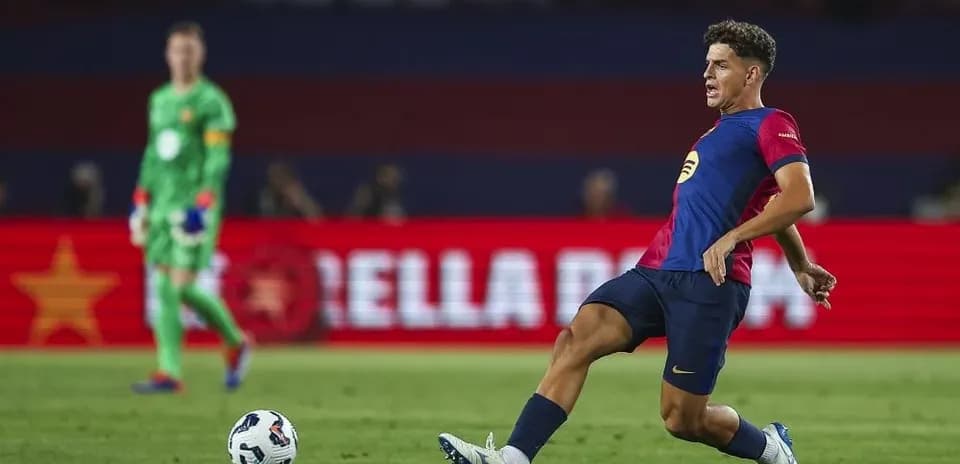 Player passing the ball during a football match