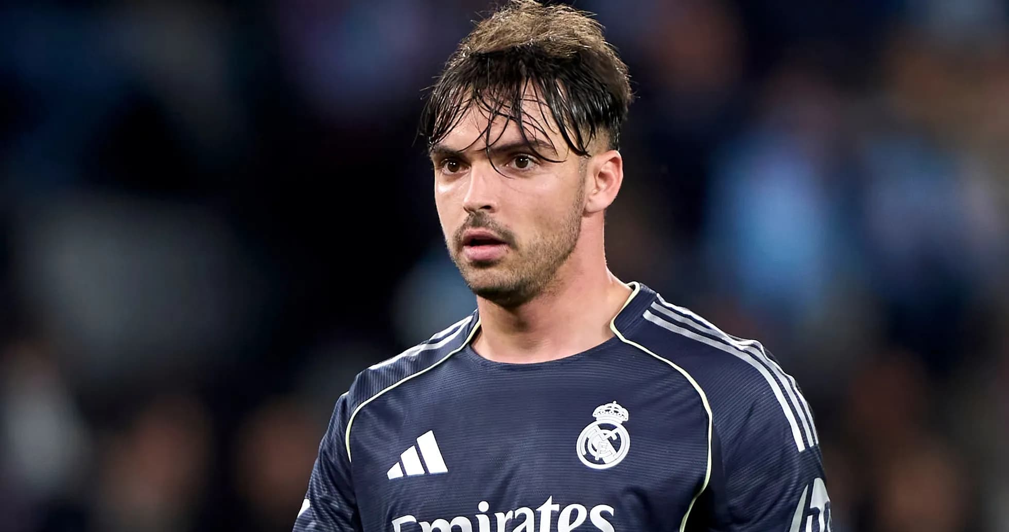 Goalkeeper in Real Madrid jersey on the field