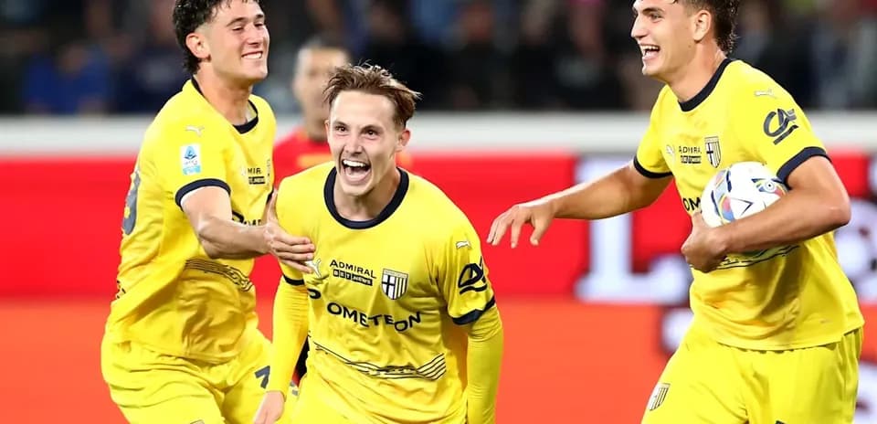 Parma players celebrating a goal during a match
