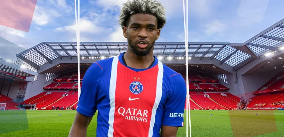 Player wearing PSG jersey at Anfield stadium