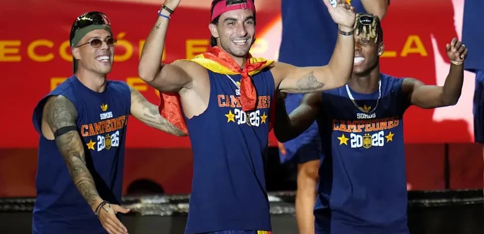 Players celebrating with medals and team shirts