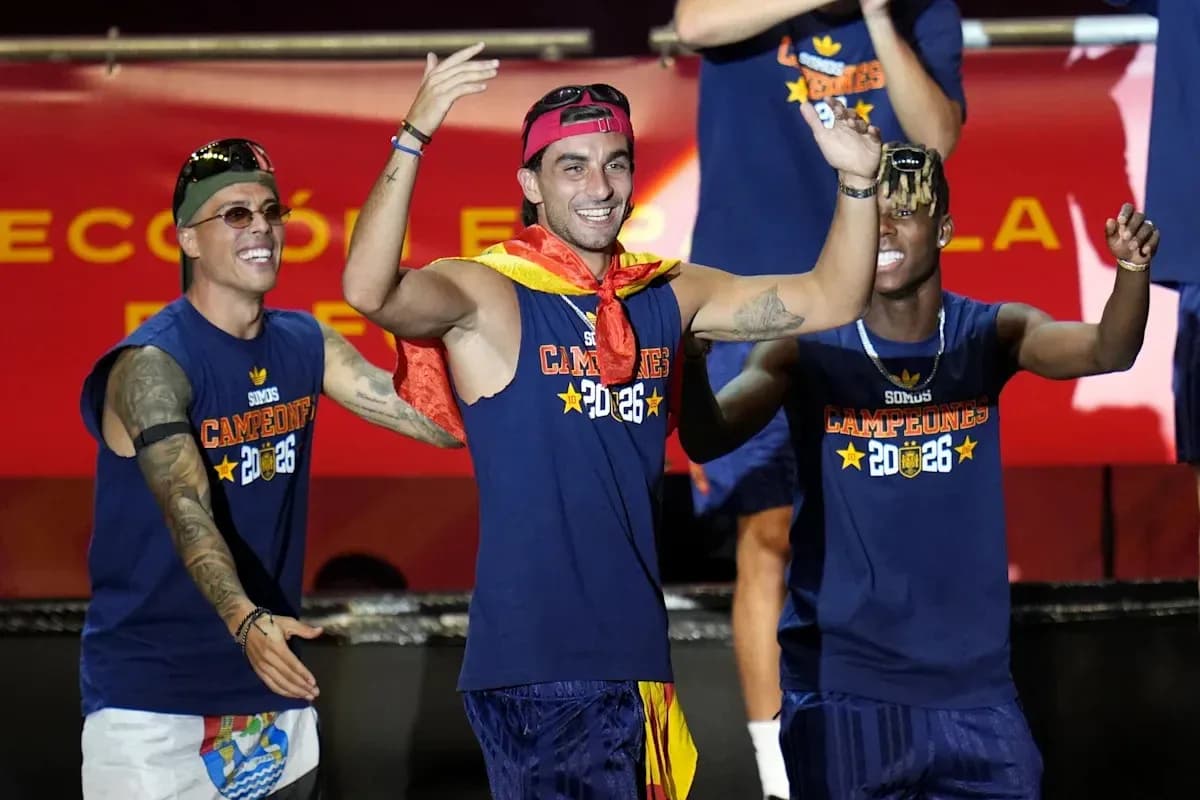 Players celebrating with medals and team shirts