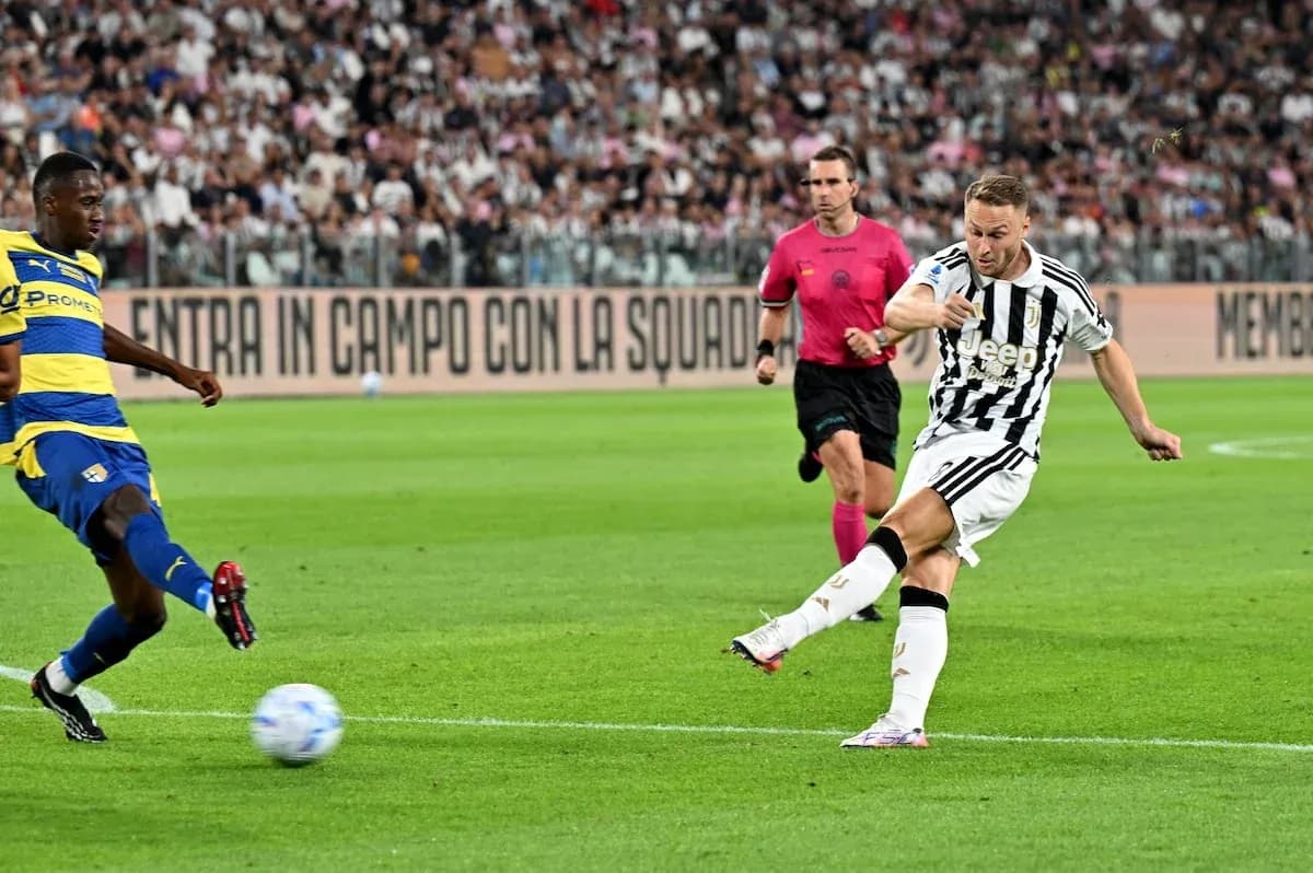 Juventus player shooting during match against Parma
