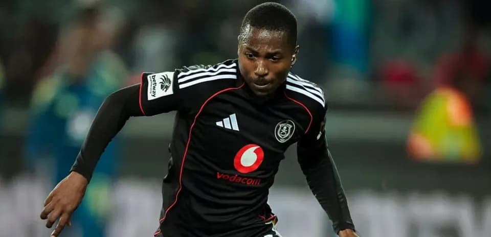 Player running with the ball in a match