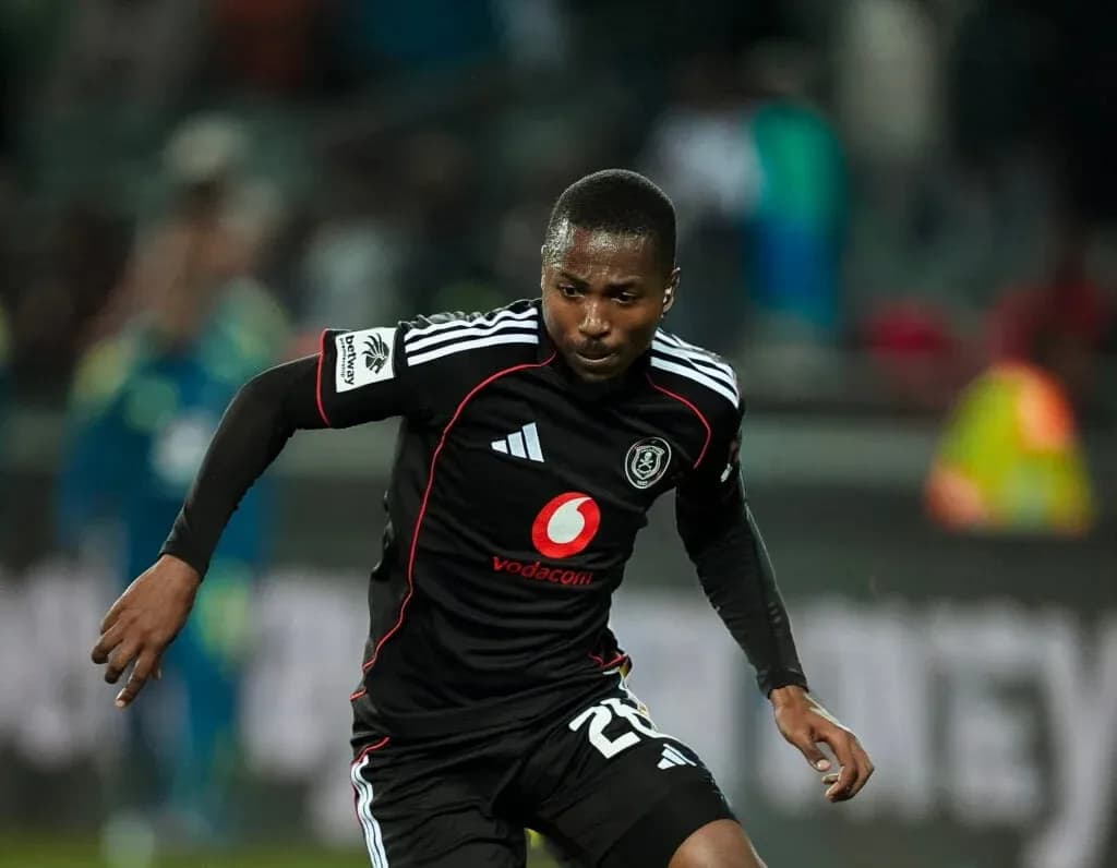 Player running with the ball in a match