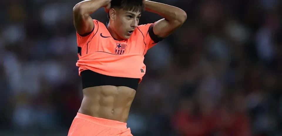 Player removing jersey during a football match